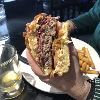 The My Burger — stacked high with bacon and slaw, fries on the side